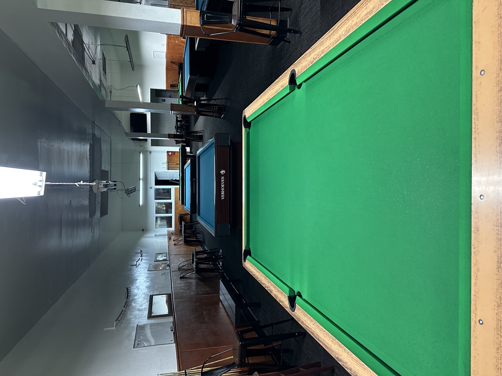 Fresh green felt under the lights